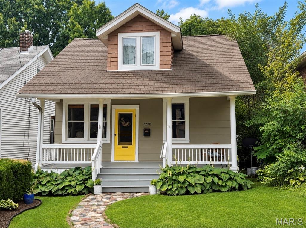 Timeless character meets modern comfort in this beautifully updated 1918 bungalow, ideally located in the heart of Maplewood. A winding stone walkway welcomes you home, leading to an inviting covered front porch - the perfect place to enjoy morning coffee or unwind at day’s end. Inside, historic charm blends effortlessly with thoughtful updates, including a sleek, updated kitchen featuring quartz and butcher block countertops designed for both everyday living and entertaining. The main level primary bedroom offers convenience and comfort, while the renovated full bath boasts luxurious heated floors for a spa-like touch. Upstairs, 2 bedrooms with vaulted and beamed ceilings provide flexibility for family, guests, or a home office. Step outside to a large deck overlooking the fully fenced backyard, creating an ideal setting for summer barbecues, evening gatherings, or quiet relaxation. A detached 2 car garage adds everyday convenience. Just moments from vibrant downtown Maplewood, you’ll love strolling to acclaimed restaurants, boutique shopping, coffee houses, and local events while enjoying quick access to I-64 and all that St. Louis has to offer. This is more than a home - it’s a lifestyle filled with charm, community, and timeless appeal. More photos coming 7/15, showings begin 7/17.