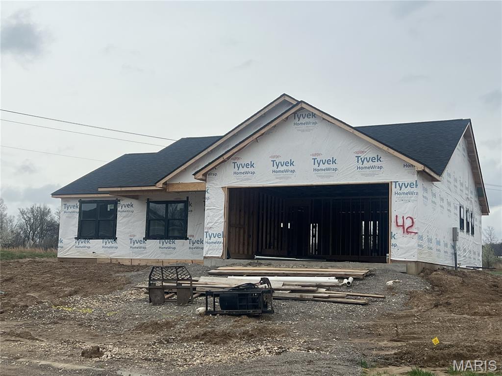 New construction located in Baldwin Farms Subdivision. Built by Forefront, this 3 bed 2 bath home offers a bright, open floorplan. The kitchen has granite countertops, shaker style cabinets, and a large center island, plus a split floor plan with main level laundry and primary ensuite. Dining area overlooks a covered deck, perfect for entertaining and enjoying beautiful days. Full unfinished walk out basement for storage and room to grow. With easy access to I55, this home is ideal for those looking for a tranquil and modern living space with a convenient location.