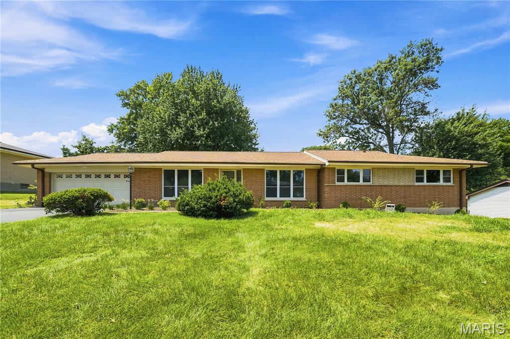 Beautifully renovated and move-in ready, this exceptional Ranch home backs to picturesque Villa Park in the award-winning Ladue School District. Offering approximately 3,380 square feet of finished living space, including the beautifully finished lower level, this four-bedroom, three-and-a-half-bath home combines timeless style with outstanding functionality. The designer kitchen features quartz countertops, white cabinetry, stainless steel appliances, a gas cooktop, breakfast bar, and sunny breakfast area. Gorgeous wood floors flow throughout the main level, while the spacious primary suite offers a luxurious bath with a quartz double vanity, lighted mirrors, porcelain tile flooring, and a walk-in shower with a rain shower fixture. A convenient walk-in laundry room is located just off the bedroom wing. Step outside to the impressive new 21' x 13' covered concrete patio overlooking the park—an ideal setting for relaxing or entertaining. The finished lower level adds exceptional versatility with a fourth bedroom, full bath with tiled shower, and an expansive recreation room perfect for a media room, fitness area, playroom, or hobbies. Extensive improvements include all new plumbing, wiring, electrical, sump pump, and water heater. Nestled in a charming, tree-lined neighborhood with easy access to Clayton, the airport, shopping, dining, and major highways, this outstanding home offers the ease of one-level living with broad appeal for buyers of all ages.