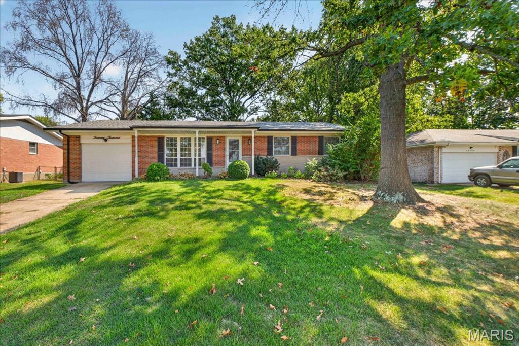 Welcome home to this freshly updated Florissant ranch, where fresh paint, a new roof (2025), and a functional floor plan make everyday living easy. Step inside to a bright Living Room that flows into the Dining Room, Kitchen, and spacious Family Room, creating an inviting layout for everything from quiet evenings at home to gathering with family and friends. The Kitchen features granite countertops, stainless steel appliances, and plenty of workspace to keep everyone connected.

The Primary Suite offers a peaceful retreat with a beautifully updated Bath, while two additional Bedrooms and a second Full Bath provide flexible space for family, guests, or a Home Office.

The Lower Level expands your living space with a large Rec Room, a versatile Bonus Room perfect for a workout space, craft room, or playroom, plus a dedicated Laundry Room and generous storage.

Outside, enjoy a fully fenced Backyard with room for pets, play, gardening, or entertaining. A covered Patio offers the perfect spot for morning coffee, while the adjoining open Patio is ready for grilling and outdoor gatherings. A storage Shed provides convenient space for lawn equipment and outdoor essentials.

Conveniently located in an established neighborhood just minutes from Cross Keys Shopping, restaurants, parks, and everyday conveniences, this move-in ready home offers the perfect blend of comfort, updates, and location. Come see your new home today!