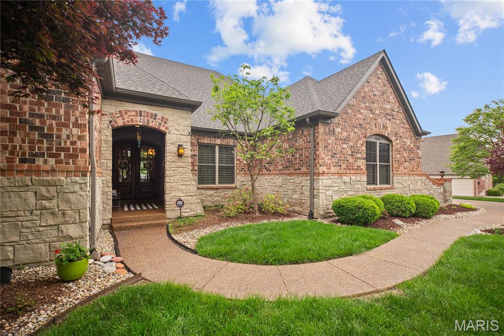 Welcome to your private retreat on the bluffs of the Mississippi River! This impeccably maintained, one-owner home offers nearly 8000 sq ft of luxurious living space, nestled on a serene 1.6-acre level lot surrounded by nature, birds, and wildlife.  
Built in 2006, this custom home was designed for comfort, entertaining, and timeless elegance. The heart of the home is an incredible chef’s kitchen with premium appliances, breakfast room, dining room; perfect for hosting dinner parties or preparing family meals. Step into the expansive owner’s suite, complete with a spa-like bathroom and walk-in closet. The main level also includes two additional bedrooms, J&J bath, hearth & laundry. The lower level is made for entertaining; huge rec room, full bar, game room, media room, and additional bedroom and full bath for guests or multigenerational living. Step outside to your private backyard oasis with an in-ground pool, semi-wooded view and relax enjoying nature.  Do not miss seeing this one! Additional Rooms: Mud Room