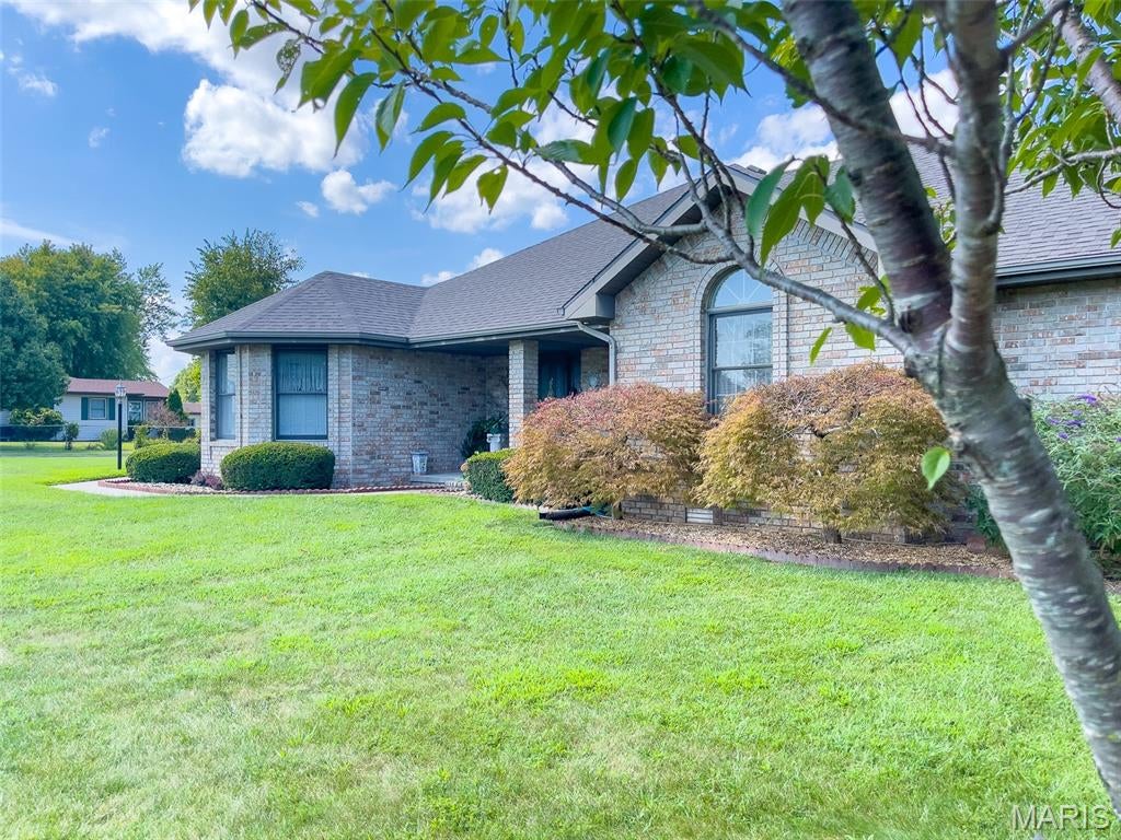 Looking for a QUALITY home with lots of space on the South side of Lebanon? This lovely all-brick home has been immaculately cared for and offers GREAT curb appeal--nestled on a corner lot with a newer roof, shed, a nicely fenced backyard. Buyers will appreciate the lovely hardwood floors, spacious floor plan, gas fireplace, built-ins, multiple living spaces, and easy access to I-44. The kitchen offers BEAUTIFUL new granite countertops, newer stainless-steel appliances including a double oven, plus a convenient center island, breakfast bar, large breakfast nook surrounded by windows, and a pantry. The family room on the back side of the home offers SO much natural light with tons of windows and a wall of built-ins surrounding a gas fireplace. The master suite has 2 entrances, double sinks, a jetted tub, walk-in shower, and walk-in closet. This home has been cared for so well! You're sure to love this layout, so book your showing soon to fall in love with it in person!!