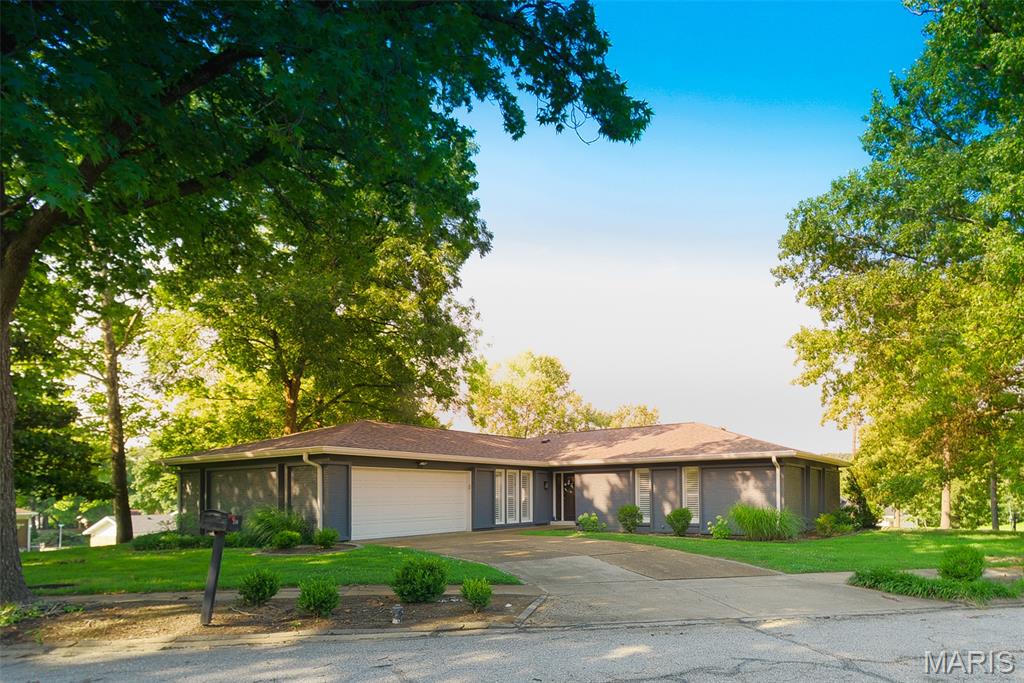 This beautifully updated 4 bedroom 3 bath ranch home boasts a sprawling open floor plan, on a nearly half acre lot.
Home has a spacious kitchen with plenty of natural light so cooking and dining have never been so enjoyable.
The home offers an updated sunroom to soak in the sun and take in the landscaped views. Hardwood flooring graces the main living areas while the bedrooms and basement have plush carpeting. The finished lower level offers extra living space and a full bath. Oversized, 2 car garage offers plenty of space for parking and storage. Equipped with Level 2 EV charger for effortless home charging
Located in a highly desirable neighborhood with convenient access to highways and nearby shopping centers. The exterior has three sides of brick, backyard face/trim professionally painted. Main floor laundry is a huge step saver. Primary suite with full bath, two closets, one's a walk-in. Three more bedrooms with plenty of closet space, and the lovely hall bath completes the main level.
LL w/office, exercise room, large family room, full bath, fifth sleeping area, and plenty of storage. Roof was replaced less than3 years ago.   Subdivision pool/clubhouse