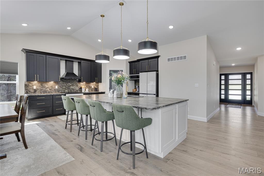 THIS IS A MUST-SEE PROPERTY!  this 3100 sq. ft. 4-bedroom, 3-bath ranch is situated on 1.39 fully wooded acres, offering exceptional privacy and a driveway large enough to accommodate 8 vehicles.
Key features include:
-Primary Bedroom:  17.10 x 14.8 and includes a bay window, His and Her closets, culvert ceiling, corner ceiling lighting, and ceiling fan with light.
The Primary Bathroom features an 8 ft shower with bench and rain head. 
-Garage: An oversized 25x42 four-car heated and cooled garage with a man door, windows, fully insulated doors, and hot/cold water bibs that go through the water softener
-Interior & Finishes: hard flooring throughout, vaulted ceilings with a reverse vault, a beautiful fireplace, and granite countertops in every wet area. The kitchen features a massive 5'5"x 10'3" island, 42" cabinets with crown, built in appliances, including Induction cook- top, built in microwave and dishwasher and a range hood, and all bathrooms include 36" tall cabinets
-Mechanics & Utilities:  400-amp electrical service, two 50-gallon water heaters, a water softener, and a heat pump equipped with a UV light and media air cleaner. All bedrooms are pre-wired for wall mounted entertainment.
 -Outdoor Living: A 21'x42' concrete patio, a 12'x12' covered deck with ceiling lights, a fan, and a 9' foundation pour. 
-Additional Amenities: A pre-wired 240V 60-amp GFCI protected sub-panel for a future hot-tub and switched GFCI outlets in the outside eaves for holiday lighting.
This home leaves no stone unturned. please schedule a viewing today! 
.