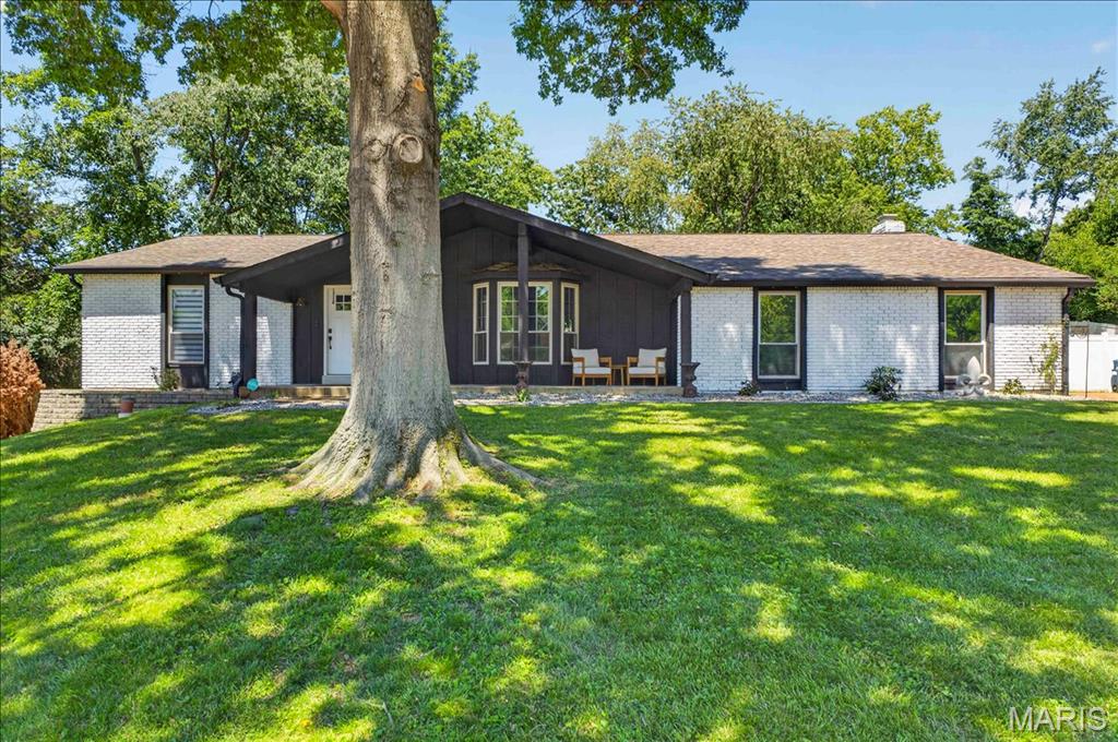 OVER 3200 SQ FOOTAGE! Opportunities like this are rare! The sellers' plans have changed due to relocation, and they are offering the next owner the chance to step into a home that has already benefited from more than $24,000 in thoughtful improvements since purchase. Their attention to detail is evident in the remarkable transformation this home has undergone.
This inviting ranch-style home sits on a cul-de-sac, offering the kind of privacy and polish rarely found at this price point. The style announces itself immediately: the front living room, which doubles beautifully as a formal dining room, features new custom lighting and bespoke built-in cabinetry accented by rich custom wallpaper, setting a tone that carries throughout the home.
The kitchen is equally impressive, boasting a brand-new refrigerator, crisp white cabinetry, a center island, and a pantry, ideal for both everyday living and entertaining. It opens naturally into the vaulted family room, where stained wood beams and a fireplace create a warm, welcoming atmosphere. From there, step outside to your private patio and fully fenced backyard, enclosed by a white vinyl privacy fence.
Down the hallway, spacious bedrooms have been freshly painted with a designer's eye. The main bathroom has been updated by the current sellers with a new vanity, light fixture, faucet, and mirror. The primary suite is generously sized, with its bathroom bathed in beautiful natural light.
Need a fully finished lower level with true bedrooms? This home delivers. A spacious recreation room, two additional bedrooms with egress windows, and a full bathroom make it perfect for guests, extended family, or flexible everyday living.
Curious if the mechanicals have been taken care of? They have. The panel box, HVAC system, and water heater were all replaced in 2023, and the sellers have made meaningful investments throughout: the garage has been drywalled and insulated, the attic features an impressive 20 inches of insulation keeping the home efficient year-round, and the exterior has been thoughtfully improved with extensive landscaping, tree removal, and a retaining wall.
Throughout the home: custom lighting, ceiling fans, smart switches at most outlets, custom hardware and hinges on every door, and painting that elevates every room. Add Rockwood Schools, a prime cul-de-sac location, and conveniences just minutes away, and this is, without question, a remarkable opportunity.
You will want to see this home as soon as possible, and we can accommodate a quick closing as well!