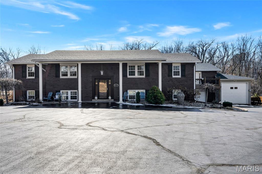 This incredible home offers space, versatility, and incredible amenities both inside and out!
The main level features a spacious family room that flows seamlessly into the kitchen, complete with a pantry closet for added storage. The primary suite offers a private retreat with an attached full bath and walk-in closet. A second bedroom and full bathroom with a convenient linen closet round out the main floor.
The walk-out lower level expands your living space with a large family room, dedicated game room area, third bedroom, and a third full bathroom—ideal for guests, entertaining, or multi-generational living.
Step outside and you’ll find your own backyard oasis featuring a spacious deck overlooking a saltwater pool equipped with both a heater and cooler for extended seasonal enjoyment. A cozy wood-burning fireplace adds warmth and charm during cooler months, while the convenient pool house offers a kitchen perfect for backyard barbecues.
Car enthusiasts, hobbyists, or those needing extra space will love the attached 2 car garage & additional detached 2 car garage—complete with an updated above-garage apartment. This impressive space includes a family room, full kitchen, bathroom, and bedroom with hardwood flooring throughout, offering excellent potential for guests, extended family, rental income, or a private home office setup.
This home truly delivers flexibility, comfort, and standout features in a desirable Columbia location. Don’t miss your opportunity to make it yours!