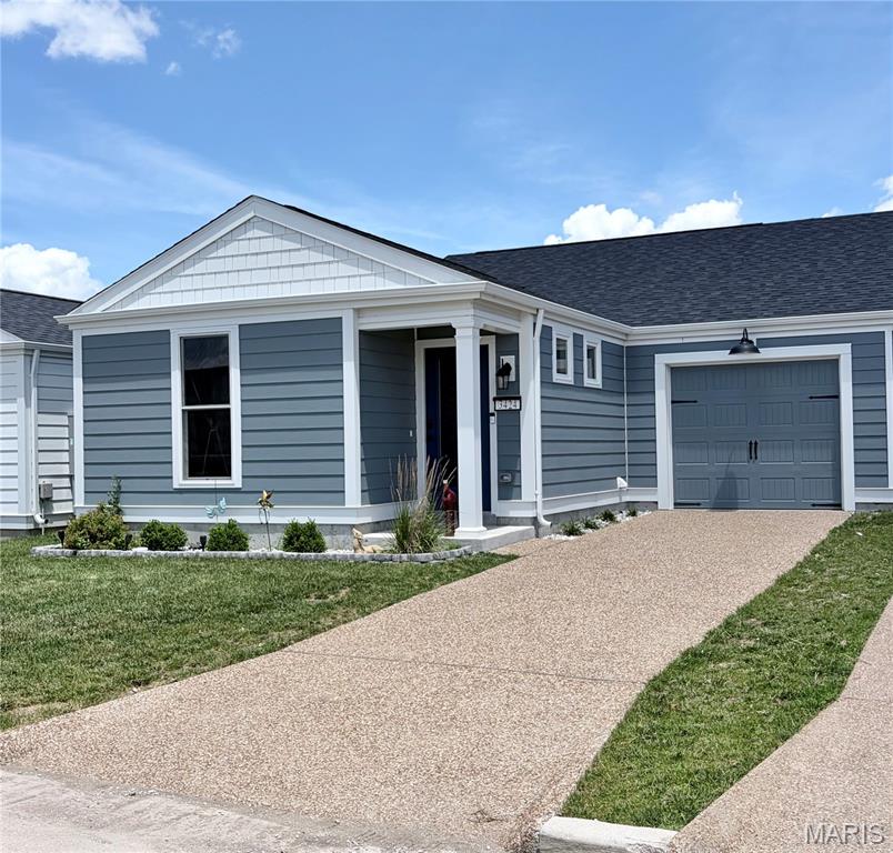 Have you heard about the New Town lifestyle? Don't miss another summer wishing you lived here. Welcome to 3424 Reed Crossing Street, a beautifully maintained, better-than-new home located in the heart of New Town, one of St. Charles County’s most unique and vibrant communities. Built in 2024 and occupied for just over a year, this move-in ready 3-bedroom, 2-bath home offers the benefits of newer construction without the wait. The back yard features a patio with a beautiful bioclimatic pergola for comfort and out door relaxation.
Step outside and discover why so many people fall in love with New Town. This master-planned community is designed around connection, recreation, and convenience. Residents enjoy access to lakes, canals, beaches, fishing, kayaking, paddle boarding, pickleball, tennis and volleyball courts, two community pools, a lazy river, parks, walking trails, an amphitheater featuring movies and concerts, seasonal festivals, parades, and year-round community events.
New Town offers an unmatched walkable lifestyle with restaurants, a coffee shop, wine bar, grocery options, local businesses, church and chapel, banquet and event facilities, fitness amenities, and even a community farm offering fresh eggs and seasonal produce. Golf carts are a popular way to get around, adding to the charm and sense of community. A new Dierbergs grocery store is planned nearby on New Town Boulevard, and the Missouri River is just minutes away.
Families will appreciate that the brand-new elementary school is just outside walking distance and provides bus service. Whether you’re enjoying a quiet evening stroll along the canals, spending the day at the pool, attending a community event, or meeting friends for coffee, there’s always something to do and someone to connect with.
This isn’t just a house, it’s a place to call home and a lifestyle you’ll love living every day. 
Refrigerator, washer and dryer included for your convenience.