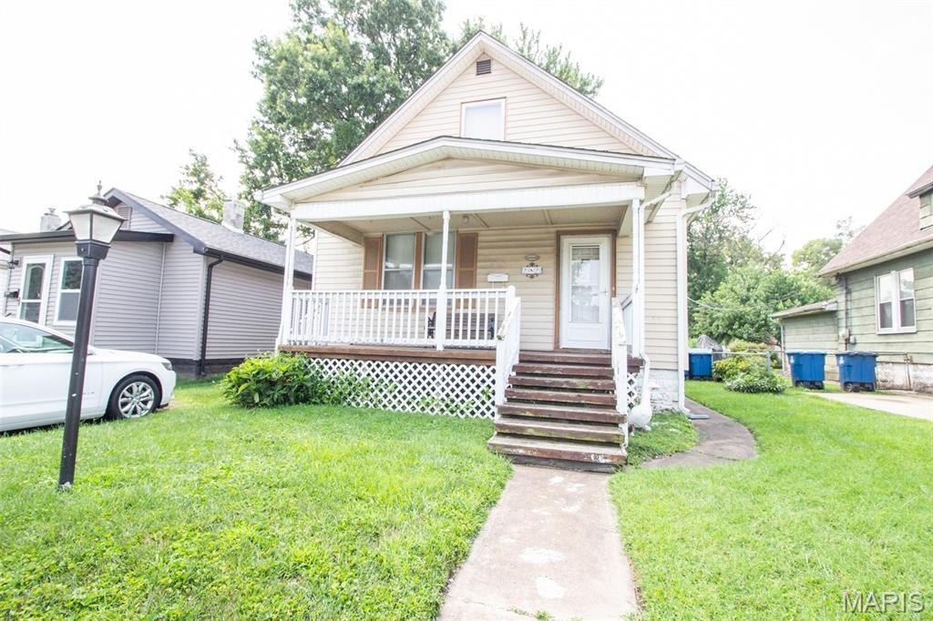 This well maintained home is ready for you! Lovely front porch lead you inside to the entry foyer, flowing directly into the spacious living room featuring hardwood floors and loads of natural light! The large formal dining room is the perfect place to host holiday dinners! Kitchen offers plenty of cabinet and counter space, and even has a pantry! Upstairs you will find 2 great sized bedrooms and full bathroom. The basement is unfinished and provides loads of storage space! Outback you will love the deck that overlooks the fenced yard! Call for your private showing today! Buyer to verify all MLS data. SOLD AS IS.