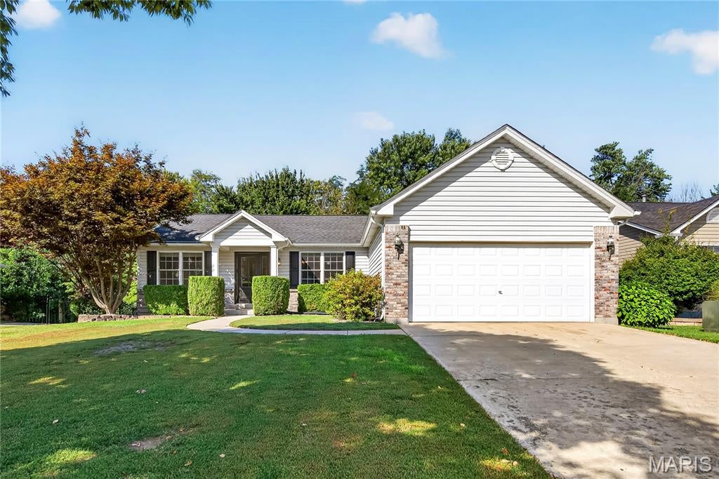 Fantastic, 4 bedroom, 3 bath ranch in the desirable Homefield neighborhood!  This one owner home has been beautifully maintained and offers approx. 2,851 sq ft of amazing living space including the finished lower level.  Sitting on a cul de sac lot, backing to trees, this home is a short walk from the center park, playground, green space, and pool. There is excellent curb appeal with brick, vinyl siding, architectural shingles, enclosed fascia/soffits, garage coach lights, landscape, glass front door and tree lined back yard.  Features include vaulted ceilings in the Entry-Great Room-Dining area-Kitchen-Breakfast Room, rich hardwood flooring, 2 fireplaces, white cabinets, granite countertops, seating bar in the Kitchen, tile backsplash, gas range, microwave, dishwasher, 2 refrigerators, main floor laundry, bay window in the Primary Bedroom, double bowl vanity in the Primary Bath with separate tub and shower, walk in closet and more.  The finished, walkout lower level has a Family Room with a gas fireplace, custom wet bar, Recreation Room, full bathroom, large Bedroom, and plenty of storage.  The outdoor living checks all the boxes with a 15 x 27 composite deck with metal railing, steps to a patio and a 27 x 15 Sunroom under the deck.  The back yard is level and backs to mature trees.  Additional features include a salt system water softener, wash sink in the laundry room, Andersen windows, recessed lighting, 50-gallon water heater and a humidifier.  Loaded with amenities, Homefield has 2 community pools, a center park and playground, sports court, picnic pavilions, and an elementary school on site just steps away.  Put this home on your must-see list!