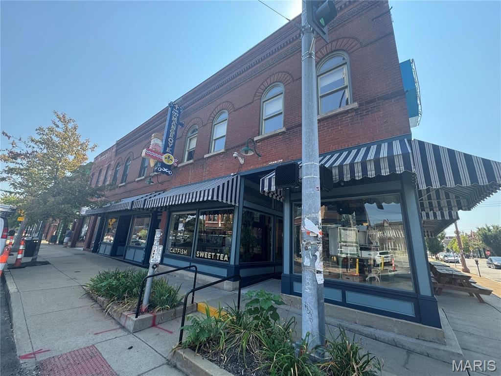 Iconic corner restaurant with large kitchen, dining room, bar, basement, office, two bathrooms! Former home of Grace Meat + Three, and Sweetie Pies. Kitchen already built-out with multiple hoods, stainless steel walls, multiple walk-in coolers, sinks, dishwasher. Offsite parking available for food truck or employee/customer parking. Fenced backyard with concrete pad for smoker or other exterior cooking equipment. All updated electrical, mechanical, plumbing. Professionally managed by Mangrove. Two apartments above the restaurant: one is occupied by resident and the other could be available for the restaurant tenant. NNN are additional $2,000/month.