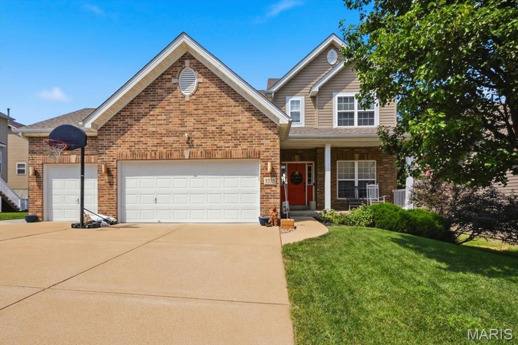 Updated 2-sty in the Mirasol community with fully fenced, flat yard! This beautiful home impresses w/brick front exterior, 3 car oversized garage w/extended bay, architectural shingles & covered from porch. Walk in to over 3300 sq ft of living space, neutral colors, updated wood look pattern vinyl floors & more. Entry foyer includes a coat closet & flanked by a living room that can serve as a home office space. Formal dining room improved with both decorative & crown moldings. The family room is spacious & open w/bay window extension, recessed lighting & ceiling fan. Gourmet, eat-in kitchen has a large center island, SS appliances, 42 in cabinets & electric range. Main floor laundry & half bath. Upstairs is a master BR suite w/vaulted ceilings, luxury master bath, 3 add. spacious BR's & 2nd full bath. LL has been professionally finished w/family/rec room, 3rd full bath, storage space & egress window so you can add an additional BR in the future. Out back is a premium, flat, fully fenced in yard that backs to wooded common ground. RSD, Jeffco Taxes, zoned HVAC.