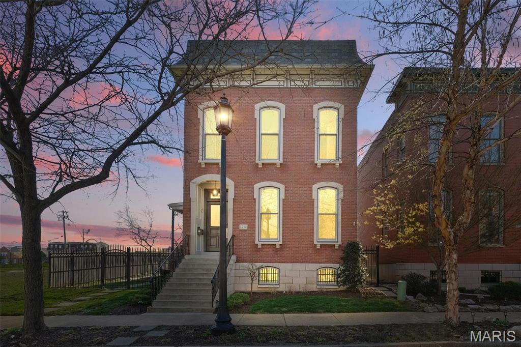 This custom designed 3 bed, 3.5 bath estate spans 3,835 sq. ft. of luxury. Every detail is meticulously crafted, from rich hardwood floors to the custom office with custom built ins and crown molding. The chef’s kitchen features 42” cabinetry, quartz countertops, Wolf appliances, beverage fridge, refrigerated drawers, an ice maker, and a spacious walk in pantry. The laundry room offers custom cabinetry, a sink with base cabinet, and refined crown molding. The living room showcases a gas fireplace with a striking stone surround, transom windows, and a chic bar area for entertaining. French doors open to a covered composite deck for seamless indoor-outdoor living. The primary suite offers a coffered ceiling, a luxurious walk-in closet with an island, and a spa like en suite with a steam shower and dual vanities. Two additional bedrooms share a lavish Jack & Jill bath. The lower level includes a full kitchen, family room, rec room, and bath. A detached 2-car garage completes this estate.