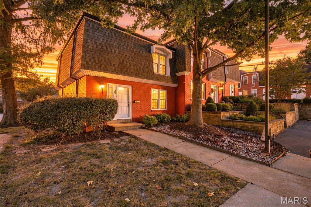 Nestled within the highly acclaimed Ladue School District, this lovely 3-bedroom, 2-full bath townhome offers a perfect blend of comfort, style, and convenience. The inviting main level features a bright, open floor plan enhanced by new luxury vinyl plank flooring throughout. Enjoy a spacious living room, separate dining area, kitchen, and a full bath, creating an ideal space for both everyday living and entertaining. Upstairs, the primary suite features a generous walk-in closet and hardwood floors.  The two additional bedrooms are also spacious and are highlighted by hardwood floors. New carpet on the staircase and upper hallway adds a fresh touch and warmth to the second level. The partially finished lower-level family room provides valuable additional living space, perfect for a media room, play area, home office, or entertaining guests.  Step outside to a private fenced backyard complete with a patio, ideal for relaxing or outdoor gatherings. Two assigned parking spaces add everyday convenience. A wonderful opportunity to enjoy low-maintenance living in a sought-after location close to shopping, dining, parks, and top-rated schools.