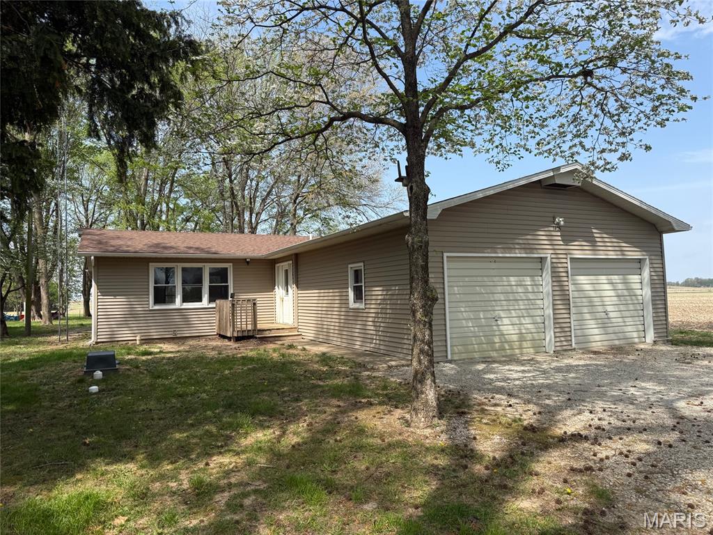 Located just outside of town and close to the golf course , this 2-bedroom, 1-bath home offers flexibility and room to grow. A spacious bonus room provides the perfect opportunity for a third bedroom, family room, home gym, or whatever suits your needs.

Recent updates include new carpet in the living room, hallway, one bedroom, and bonus room, along with updated plumbing and a new shower in the bathroom. Major improvements include a new roof (2024), furnace and A/C (2024), siding (2023).

The home also features a nicely sized laundry room and a 2-car attached garage with additional storage space. All-electric for efficiency and convenience, this property combines comfort, updates, and versatility—ready for you to make it your own.

More photos coming soon. Call to schedule your viewing!