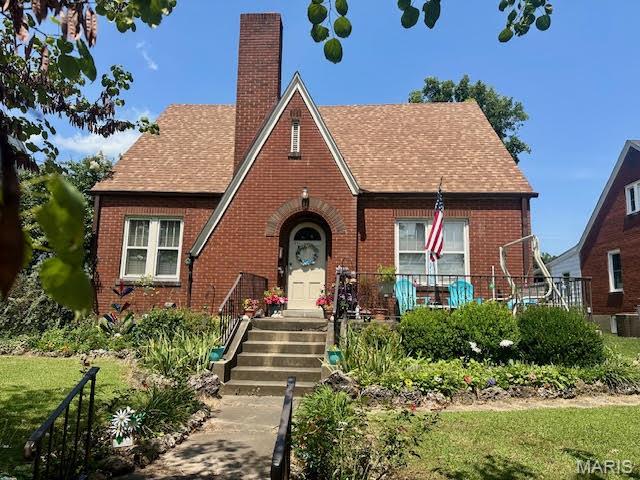 Welcome to this charming 1940 bungalow, full of timeless character and architectural details. Offering approximately 1,696 finished square feet, this home features 4 bedrooms and 2 full bathrooms, with two bedrooms and a full bath conveniently located on the main level and two additional bedrooms with a second full bath upstairs.

Beautiful arched doorways inside and out add to the home’s distinctive character, while original hardwood flooring brings warmth and charm throughout. The enclosed back porch is surrounded by windows, creating a bright and inviting space to enjoy throughout the seasons.

A full unfinished basement provides plenty of additional storage and possibilities, including a separate room ideal for a safe room, storm shelter, or additional storage area.

With its classic bungalow architecture, original details, spacious layout, and functional use of all three levels, this home offers a wonderful combination of historic charm, character, and everyday practicality