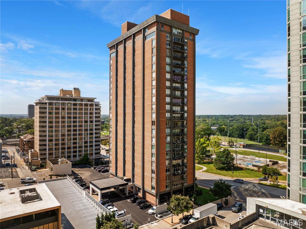 Experience the pinnacle of luxury high-rise living in the heart of Clayton’s prestigious Central Corridor. Positioned on the sixth floor, this distinguished condominium offers an elegant open floor plan, refined finishes, and expansive views overlooking the Clayton skyline & rooftop views of downtown St. Louis visible in the distance, the residence provides a sophisticated backdrop for both quiet evenings and gracious entertaining. More than a private residence, this is a lifestyle centered around community, connection, convenience, and peace of mind. Enjoy the welcoming atmosphere of a full-service building where neighbors gather, friendships flourish, and everyday living feels effortless. Professional doorman service, controlled building access, and secure parking provide an added level of privacy, security, and confidence—allowing residents to enjoy the freedom of a lock-and-leave lifestyle with the reassurance of a well-managed, secure residential environment. Residents enjoy an exceptional collection of amenities, including secure parking, professional doorman service, fitness center, swimming pool, library, meeting rooms, and inviting spaces for entertaining. Nearby Shaw Park offers pickleball courts, walking paths, green space, and opportunities to enjoy the outdoors. Straub’s is just a short stroll away, while Dominic’s Famous Italian Restaurant is conveniently located within the building—perfect for an intimate dinner, a celebratory gathering, or an evening with friends. Surrounded by Clayton’s premier restaurants, cultural attractions, business centers, and community events, this residence places the best of the Central Corridor at your fingertips. Whether enjoying a private evening overlooking the skyline, connecting with neighbors, attending the Famous Clayton Art Fair, or taking advantage of the building’s resort-style amenities, every detail supports a life of comfort, elegance, and ease. For the executive, professional, or discerning buyer who values both luxury and peace of mind, this is sophisticated urban living at its finest—exceptional service, enhanced security, resort-style amenities, and an effortless lifestyle in one of St. Louis’ most desirable locations.