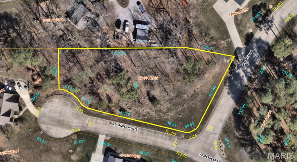 Corner, .96± Ac. lot cul-de-sac lot nestled within Tall Timbers Subdivision in Smithton, IL! This property offers a peaceful setting surrounded by established homes within a gated community. The lot has recently been cleared of some overgrowth of the brush giving the perfect site to build the home of your dreams with the possibility of a walk out basement. The subdivision has an annual HOA fee of $400, covering common area maintenance and upkeep. Public utilities are available nearby, though tap-on fees have not been paid. When building, a sewer pump will be provided by the HOA however, the tap on fees and the installation will be the responsibility of the buyer/new owner. The property is zoned Single Family under Smithton zoning, requiring municipal approval for construction and use. An excellent opportunity to build in a desirable neighborhood offering privacy, natural beauty, and convenient access to surrounding amenities.