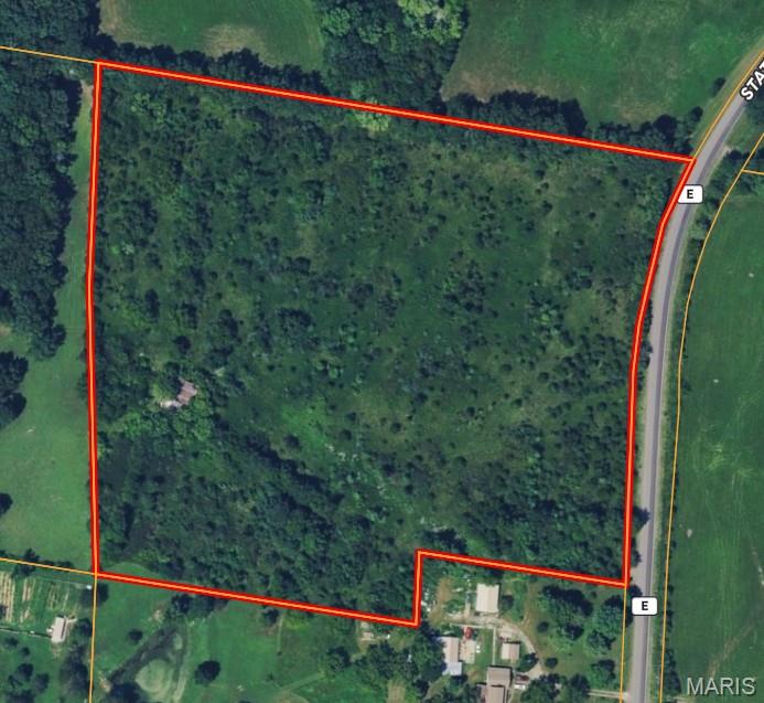 13+/- Beautiful Acres on Blacktop State Road E.  This property is ready for your vision.  It would make a great build site for your dream home, hobby farm, or destination for recreation. The topography is gentle across the property and lends it self to full utilization of every acre.  With some clearing, this property would be great for horses or livestock.  Just 10 miles south of De Soto and only 4 miles west of Highway 67.  Call to schedule a private tour today.