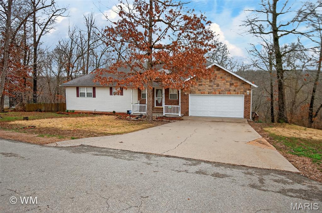 Get ready to fall in love with the space, comfort, and flexibility this home has to offer. Featuring 5 bedrooms with a possible 6th bedroom in the basement, 3 bathrooms, and approximately 3,240 sq ft of living space, this home provides the kind of room that’s getting harder and harder to find. Step inside and you’re welcomed by beautiful hardwood floors that bring warmth and timeless character to the main living areas. The very large living room serves as the heart of the home, offering an inviting space for gatherings, celebrations, or simply unwinding after a long day. Natural flow between the living spaces makes the home feel open, comfortable, and perfect for both everyday living and entertaining. The home offers generously sized bedrooms and a layout that gives everyone their own space while still feeling connected. Downstairs, fresh paint and brand new carpet give the lower level a bright, refreshed feel. The finished basement adds even more versatility, with space that could easily serve as a 6th bedroom, guest suite, home office, hobby room, or additional living area. Outside, the property truly shines. Sitting on nearly an acre, you’ll enjoy the freedom of extra outdoor space — perfect for relaxing evenings, entertaining friends and family, gardening, or simply enjoying the open surroundings. The 2-car garage provides convenience and additional storage to round out this well-sized property. Homes with this much square footage, bedroom count, and yard space don’t come around every day. If you’ve been searching for a home that offers room to grow, room to gather, and room to breathe, this one deserves a spot at the top of your list.