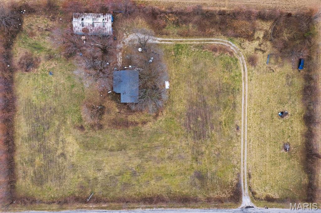 Now available: 3.2 acres in O’Fallon, IL (St. Clair County), zoned Rural Non-Farm. Opportunities like this are rare. The property currently features a mobile home in mid-renovation, along with a large barn and stables. Located off Old Collinsville Road, it offers convenient access to highways and shopping and is within the Marie Schaefer Elementary School district. This versatile parcel presents endless possibilities—build your dream home, complete the existing renovation, or develop the land to suit your vision. The land is ready, and the potential is yours to bring your dream project to life.