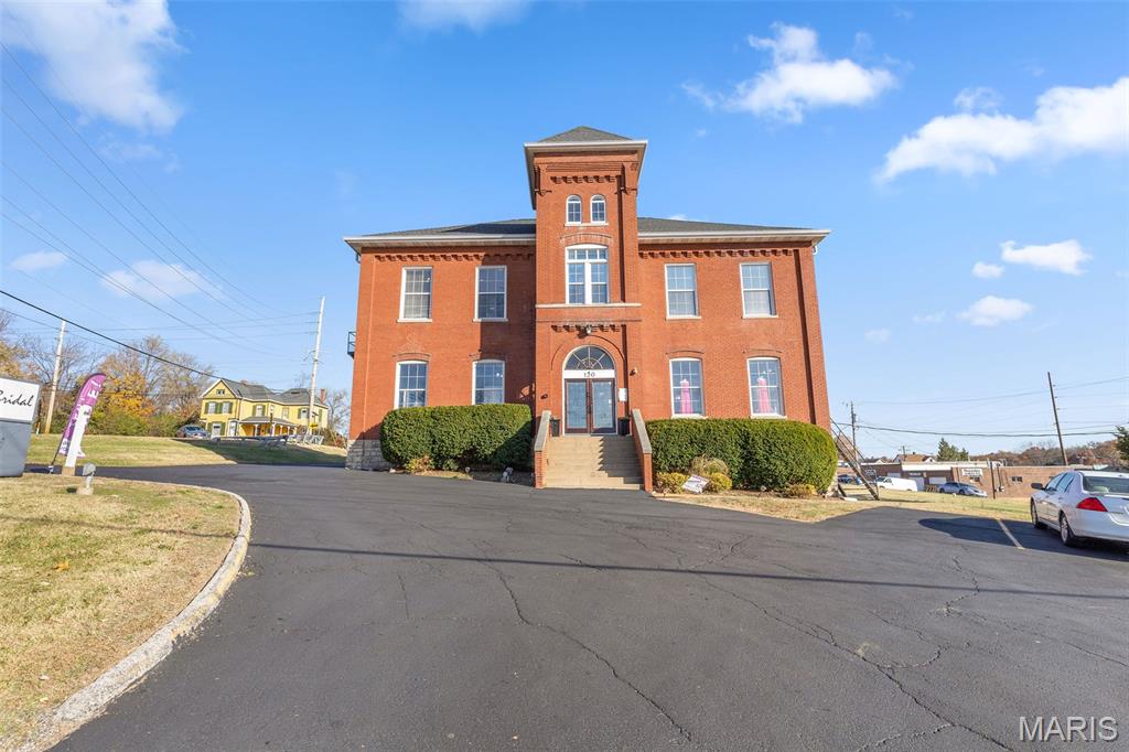 Great Opportunity with this Historic property right off Manchester Road sitting on 1.1 Acres. The original Manchester school house was most recently a bridal boutique. The property features over 5200 SQ ft of space, has an elevator, multiple bathrooms, multiple private offices, full kitchen, and 30 parking spaces. There is a second building on site that is great for an additional office or document storage. Property has excellent visibility right off Manchester road and is right off a signalized intersection. Great for retail, office, lawyer, doctor etc.
