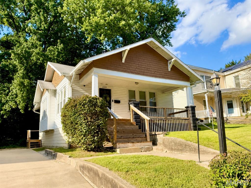 Charming, clean and well cared for home with gorgeous hardwood floors, tall ceilings, and many updates! New front porch & back steps - 2 years ago, new driveway - 7yrs, roof -9 yrs, vinyl siding, soffits, facia, and gutters - 2 yrs, new motor for AC last year, windows-12 yrs. Home offers whole has attic fan, CLEAN basement with nice laundry area and plenty of storage. Wood burning fireplace was cleaned and capped 9 years ago, decorative only. This is a must see!!