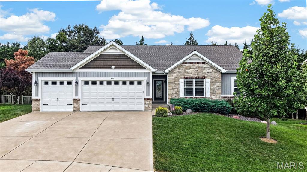 Some homes simply give you more space. This one gives you more ways to live in it. Beautifully appointed and thoughtfully designed, this 3,730+ sq ft walk-out ranch offers an exceptional blend of style, comfort and flexibility in highly sought-after Huntsdale. With three bedrooms on the main level and three additional bedrooms on the walk-out level plus suprising storage space, the home's layout easily adapts to the way life changes—whether you need private guest accommodations, a home office, fitness space, hobby rooms, a teen retreat or room for multigenerational living. And with a spacious recreation room downstairs, the lower level functions as a true second living zone rather than simply a basement.

From the moment you enter, soaring 12-foot ceilings, elegant crown molding, custom architectural details and designer finishes create an impressive yet inviting atmosphere. The beautifully designed kitchen is the heart of the home, featuring an oversized granite island, abundant cabinetry, subway tile backsplash, stainless steel appliances, designer lighting and above- and below-cabinet illumination. The adjacent dining area and open living spaces create an effortless setting for everyday living and entertaining, while a dramatic custom accent wall adds distinctive character.

The spacious primary suite offers a peaceful retreat with a beautifully appointed ensuite, generous walk-in closet and thoughtful finishes. The remodeled main-floor laundry room brings everyday convenience to a new level with custom cabinetry, butcher block countertops, utility sink and folding station.

Step outside to enjoy the privacy of a tree-lined backyard enclosed by a professionally installed vinyl fence. Relax on the deck, gather on the extended patio, tend the raised garden bed or simply enjoy the mature trees and peaceful surroundings. Front and rear irrigation keep the landscaping looking its best.

Additional highlights include a 3-car garage with oversized 8-foot doors, Trimlight soffit lighting, walk-out lower level, abundant storage and a location within the Wentzville School District and North Point High School boundaries.

And for qualified buyers, an increasingly rare opportunity: the existing VA loan may be assumable at an exceptional 2.375% interest rate, subject to lender approval, buyer qualification and the terms of the existing loan.

This isn't simply a home with more bedrooms. It's a home with more possibilities—beautifully finished spaces that can adapt to the way you live today and the way life changes tomorrow.