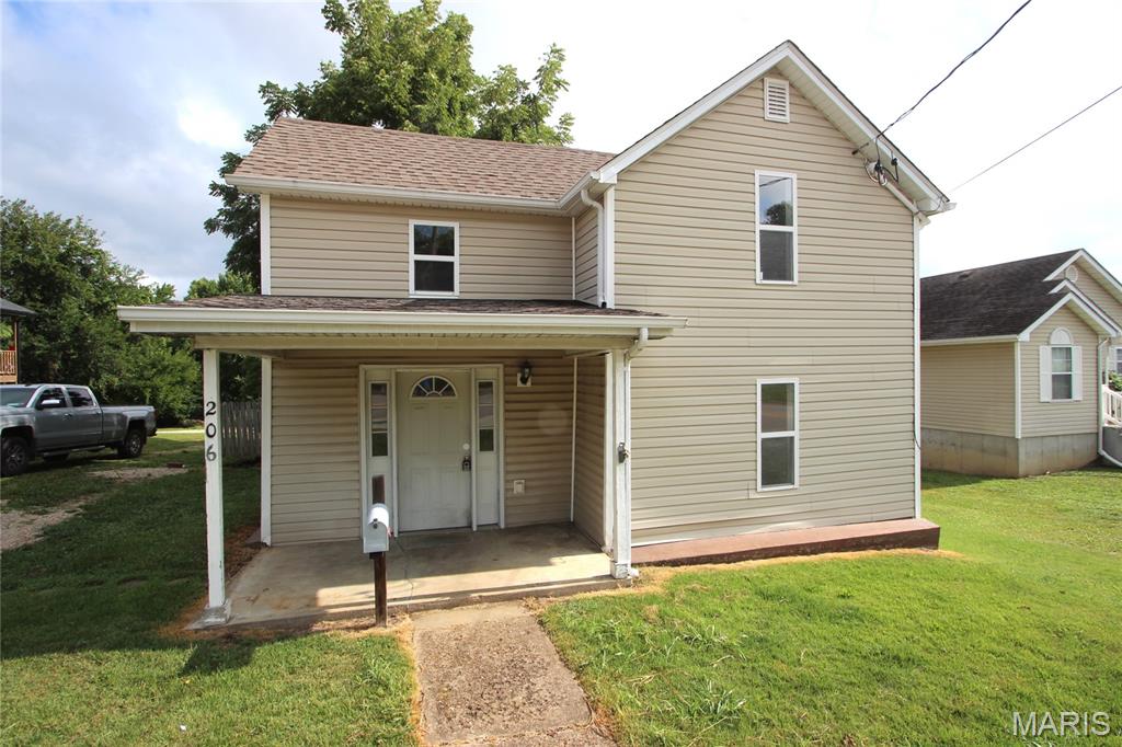 Charming 1.5-story home featuring 2 bedrooms and 1 bath, with convenient main floor laundry. Enjoy relaxing on the covered porch or take in the view from the deck overlooking a nicely sized backyard. Inside offers a functional galley-style kitchen and a comfortable layout perfect for everyday living.