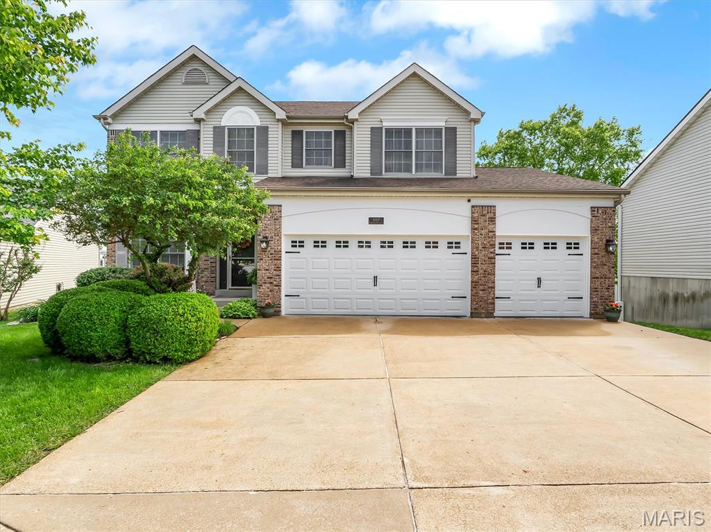 This beautifully updated four-bedroom, four-bathroom home offers the perfect blend of comfort, style, and functionality, complete with a spacious three-car garage. The main level features both a welcoming great room with a cozy fireplace and a charming front sitting room, while the open-concept kitchen, dining, and living areas provide exceptional flexibility for everyday living and entertaining. The kitchen is a standout with newer granite countertops and custom cabinetry. Upstairs, you’ll find four generously sized bedrooms, including a spacious primary suite with a double vanity. The finished walkout lower level adds even more living space, featuring a large office area that could easily serve as a fifth bedroom, an L-shaped recreation and family room with a wet bar, a full bathroom, and abundant storage. Additional highlights include built-in features throughout, a large deck with a retractable awning overlooking a well-maintained yard, newer carpeting (Feb. 2026), luxury vinyl plank flooring (Nov. 2025), fresh interior paint (Jan. 2026), and a newer air conditioning system (Jul. 2023). Schedule your showing today!