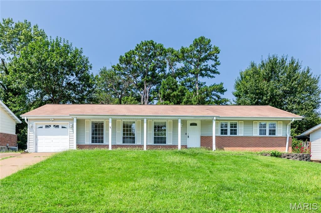 Welcome to this beautifully maintained 3-bedroom, 2-bath ranch home nestled in the desirable Timber Run subdivision and located within the highly regarded Parkway School District. Offering 1,512 square feet on the main level, this inviting home features a bright and functional floor plan with spacious living areas, an updated kitchen with ample cabinetry and counter space, and comfortable bedrooms designed for everyday living. The partially finished lower level provides additional flexible living space, perfect for a family room, recreation area, home office, or fitness room, while still offering abundant storage. Step outside to enjoy the private backyard, ideal for relaxing, entertaining, or gardening. Conveniently located near shopping, restaurants, parks, major highways, and everyday amenities, this home offers comfort and an outstanding location. Don't miss this wonderful opportunity to own a move-in-ready home in one of West St. Louis County's most sought-after neighborhoods. Schedule your private showing today!