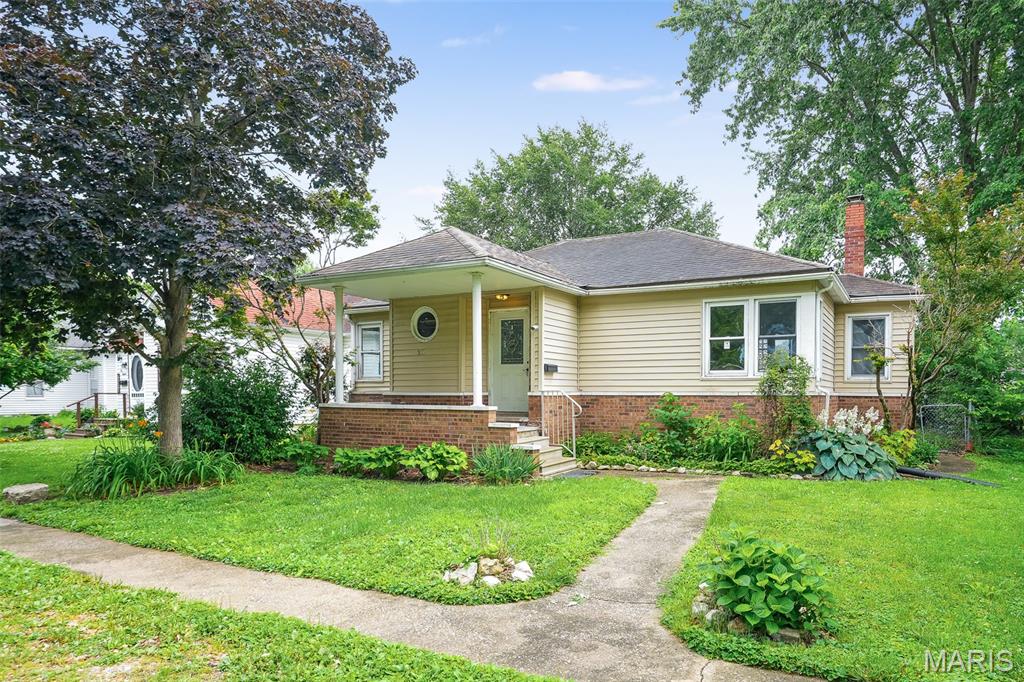 Welcome to 217 W. Walnut St. in Benld, IL! This charming 2-bedroom, 1.5-bath home offers a great opportunity for homeowners and investors alike. Inside, you'll find a spacious open living room perfect for relaxing or entertaining, along with fresh paint and luxury vinyl flooring throughout, giving the home a clean, modern feel. The home features a full bath and a half bath that currently houses a stackable laundry setup but can easily be converted back to a stand-up shower if desired. The water heater is only 3 years old, providing added peace of mind. Step through the sliding glass doors to enjoy a cozy patio and side yard, offering the perfect spot for outdoor gatherings, gardening, or simply unwinding after a long day. An oversized 2-car garage provides ample room for vehicles, storage, or a workshop space. While the home could benefit from a little TLC, it is competitively priced and presents an excellent opportunity to build instant equity while adding your own personal touches. Don't miss your chance to make this affordable property your own!