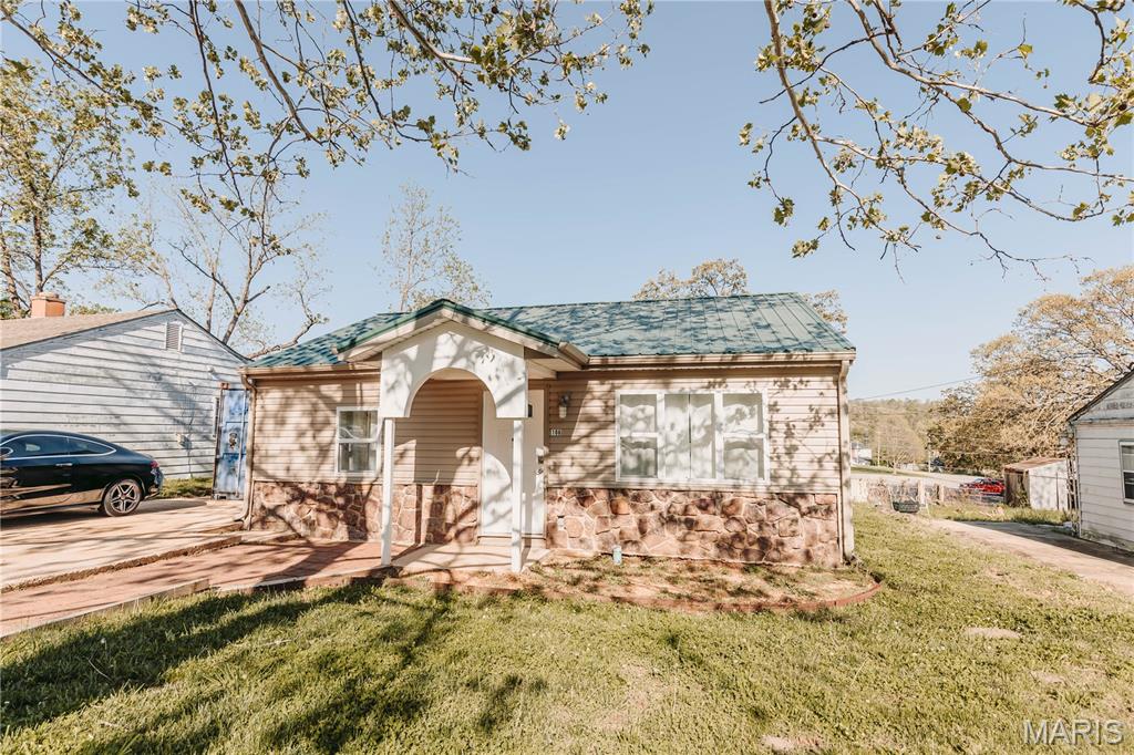 Plans changed, creating a chance to own this lovingly remodeled charmer! Updated top to bottom and move-in ready, this unique home offers a Tesla charger, freshened paint, added touches, and a few new fixtures. Inside, you’ll find a spacious 1 bedroom, 1 bath layout with a large laundry room/walk-in closet combination, built-in storage in the living room, and a beautifully detailed kitchen with abundant cabinetry, gas oven/range, refrigerator, built-in microwave, and dishwasher. Spray foam insulation in the walls and blown-in cellulose in the attic add comfort and efficiency. Exterior features include vinyl siding and windows, a metal roof, Rubidoux rock accents, plenty of off-street parking, and a welcoming front walkway that adds to the curb appeal. Step outside the french doors off the kitchen to enjoy the nice-sized backyard, paver-style patio, and a large Conex type/shipping container that stays with the property—great for storage, workshop space, or hobby use. This one is full of charm, function, and thoughtful touches.