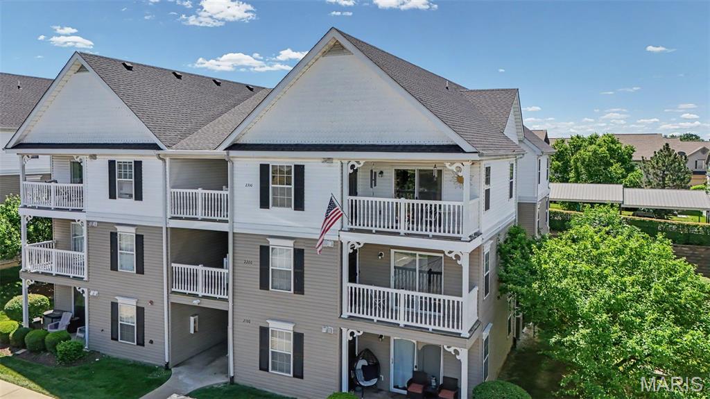Welcome home to this beautiful 2 bed, 2 bath condo in the highly sought-after Wentzville School District that is move-in-ready, featuring an open and airy floor plan with soaring cathedral ceilings that create a spacious atmosphere. Elegant Swarovski crystal chandeliers add a touch of luxury, while ceiling fans throughout provide year-round comfort. The kitchen is designed for both style and functionality, offering impressive 42" cabinetry with ample storage space. Recent updates include a newer water heater, dishwasher, and stove, giving buyers added peace of mind. The spacious primary suite and second bedroom provide comfortable living, while the low-maintenance condo lifestyle allows more time to enjoy life. As an added bonus, a home warranty is included for extra confidence in your investment. Conveniently located with easy access to shopping, dining, parks, and major highways, this home combines comfort, elegance, and value in one exceptional package.