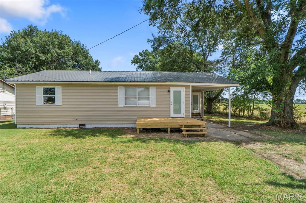 Looking for a 3 bedroom 2 bath home with modern updates in Kennett? Check this out! In addition to the primary living room, there is an additional den that could serve as a formal dining room, office or even a 4th bedroom. The newly added front porch/deck is a great spot to add an outdoor seating area! Call today to take a look at this one in person!