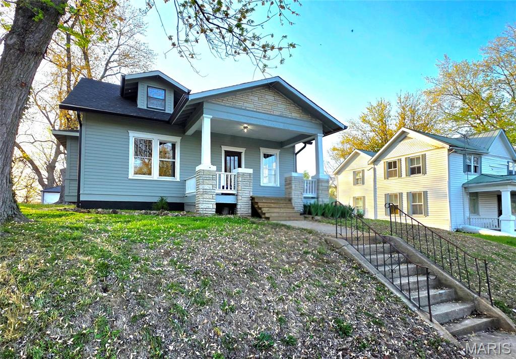 Built with 1940's quality, this Craftsman style with lots of original character will be making its debut soon!  Inside the living room you'll notice the glassed French doors leading to nice big dining room with boxed bay window.  Period millwork throughout.  The eat-in kitchen comes with walk-in pantry.  Bedrooms are housed on the upper level for privacy.  Full, walk-up basement, detached, 2-car garage with concrete floor.  Located close to shopping and Hwy 100 for easy commuting.