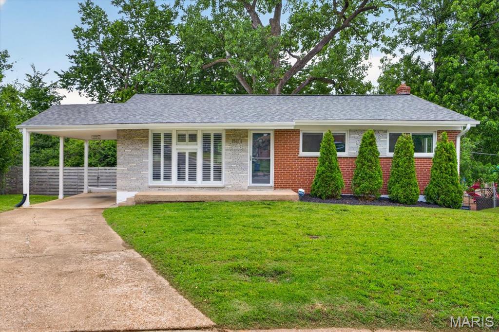Tucked at the end of a quiet cul-de-sac in University City, this thoughtfully updated 3 bed/2 bath ranch blends mid-century style with modern functionality. Clean lines, open living spaces, and abundant natural light create a timeless feel and effortless flow. The main level offers true ease of living with well-designed spaces for both casual comfort and entertaining. The lower level adds valuable flex space, ideal for a second living area, home office, or gym. Outside, a fully fenced, private backyard sets the stage for peaceful mornings or relaxed gatherings. Recent updates including roof, furnace, water heater, appliances, PVC sewer lines and more provide added peace of mind for the next owner. All just moments from the best of U City and Clayton, walkable to parks, restaurants, and everyday conveniences.