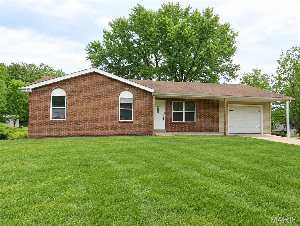 Welcome home to this charming ranch-style property offering comfort, space, and convenience all in one. Step inside to a generously sized living room and kitchen combination—perfect for everyday living and entertaining alike. The open layout creates a welcoming atmosphere with plenty of room to gather. This home features a full walkout basement, partially finished to give you flexible space for a family room, home office, or hobby area, with additional room for storage or future expansion. Enjoy outdoor living on the spacious deck overlooking the backyard, or relax with a morning coffee on the covered front porch. Ideally situated in a convenient location near I-44, this home is perfect for commuters while still being close to local schools, shopping, and everyday amenities. Whether you're starting out, downsizing, or looking for a smart investment, this property offers the perfect blend of functionality and location. Schedule your showing today and see all the potential this home has to offer!