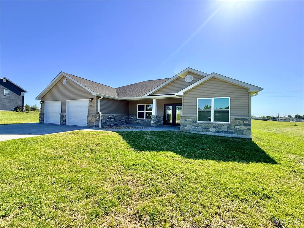 **Bonus Buyer Incentive!** Make this brand-new home even more your own with your choice of a $5,000 appliance allowance to select the finishes that fit your style, or take advantage of a $5,000 closing cost credit to help make your move even more affordable! Brand new construction loaded with custom finishes and designed with both style and
efficiency in mind! This stunning 4 bedroom, 2 bath home offers 1,916 square feet of
beautifully finished living space with an open-concept layout that feels bright, airy, and
welcoming from the moment you step inside. Luxury vinyl tile flooring flows throughout
the home, complemented by an abundance of natural light and thoughtfully selected
modern finishes. The kitchen is truly the heart of the home, featuring a large center
island, gorgeous quartz countertops, eye-catching modern backsplash, walk-in pantry,
and plenty of space for gathering and entertaining. The spacious living and dining areas
seamlessly connect, creating the perfect setup for everyday living and hosting guests
alike. The private primary suite is a true retreat with an oversized walk-in closet and a
spacious bath designed for comfort and convenience. Additional features include an
oversized garage, dedicated storage room with storm shelter, covered front porch,
covered patio, and a level yard perfect for outdoor enjoyment. Built with energy
efficiency in mind, this home includes a tankless water heater, in-line water softener,
and heat pump HVAC system for long-term comfort and savings. With custom details
throughout and quality craftsmanship at every turn, this one checks all the boxes for
modern living!