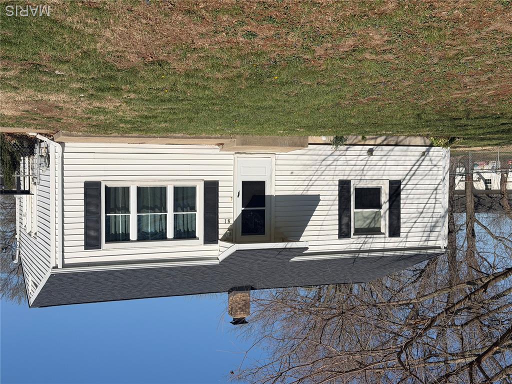 Put your spin on this Charming and full of potential, 2-bedroom, 1-bath home in the heart of Wright City.  With a little effort and some sweat equity this home will provide a huge return.  Inside, you’ll find hardwood floors flowing through the living room, hallway, and bedrooms, creating a warm and inviting feel throughout the main living spaces. The adorable eat-in kitchen painted cabinetry, along with a dishwasher, disposal, and updated lighting—making it both functional and welcoming.   A full basement offers excellent storage space and a dedicated work area, giving you room to expand, create, or simply stay organized.  
Step outside to a generously sized, fully fenced backyard set on over a third of an acre, complete with mature trees, perfect for relaxing, gardening, or entertaining. Located within city limits and close to schools, shopping, and everyday conveniences, this home offers both comfort and accessibility in a quiet neighborhood setting.  This home almost has it all and just needs your special touch to make it Amazing.