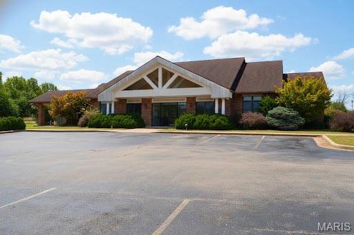 Exceptional opportunity to own a high-quality, freestanding bank building situated on 1.33 ac +/-. This 5548 sq. ft. facility offers a blend of professional design, excellent visibility, and flexible space suitable for continued financial use or conversion to professional offices, medical, retail, or professional tenants. This property features existing bank infrastructure ideal for financial services, vault & teller area, 3 drive-thru lanes, ample on-site parking, and offers prominent signage & street presence. Located on a prime high visibility corner/arterial location with strong traffic counts, and easy ingress/egress with multiple access points. This sale also includes an additional 1.31 ac +/- which the sellers would consider subdividing and selling separate, see list # 25075300. Schedule your showing today!