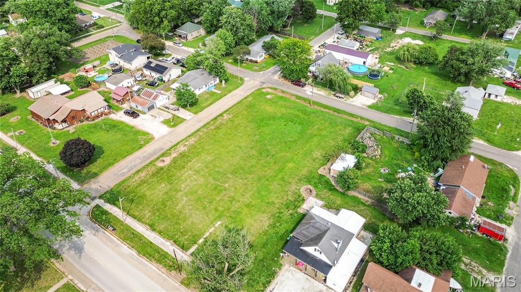 Prime Build-Ready Lots!  Four flat lots combined into one spacious parcel, offering the perfect setting to build your dream home, barndominium, or storage shed.  With no existing structures, you have a completely open canvas to design exactly what you want.  Public utilities are easily accessible, making your build even more convenient and cost effective.  Whether you are looking for a future home site or a great investment opportunity, this property checks all the boxes with space, flexibility, and potential!
