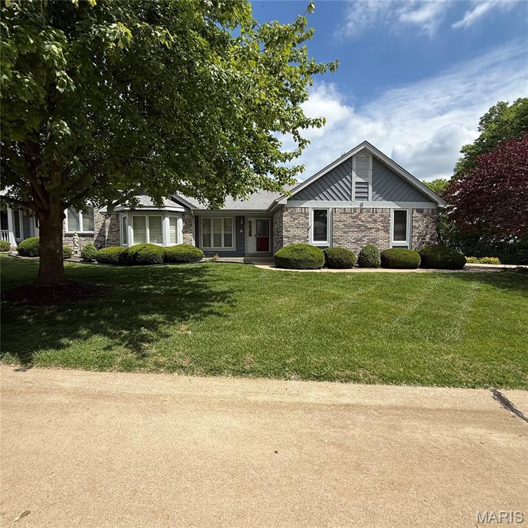 Tucked away at the end of a peaceful cul-de-sac, this beautiful end-unit 2B/3B villa offers the perfect blend of comfort, privacy, and low-maintenance living. Lawn care and snow removal are included, allowing you to enjoy a hassle-free lifestyle year-round. Inside, soaring vaulted ceilings and spacious, open-concept living areas create a bright and welcoming atmosphere. The expansive sunroom is a standout feature, providing tranquil views of the surrounding natural landscape and bluff—an ideal retreat for relaxing, reading, or enjoying your morning coffee.
The side-entry garage features an epoxy-coated floor and abundant custom storage solutions. The finished lower level significantly expands the living space with a large family room complete with a gas fireplace, a wet bar for entertaining, a private bedroom with a walk-in closet, a full bathroom, and a dedicated home office or flexible bonus room. Rarely does a rental offer this combination of space, scenic views & privacy. Tenant responsible for all utilities. First month's rent ($2500) in addition to Security Deposit equal to two months' rent, $5,000 ($2,500-Landlord, $2,500-HOA) is due at lease signing. Applicants verifiable gross monthly income must be at least three (3) times the monthly rent. Minimum credit score of 680 required. No prior evictions, foreclosures, or felony convictions. All applicants are subject to credit, background, and rental history verification and HOA board approval. $75 application fee, all occupants 18 years and older must submit individual applications.