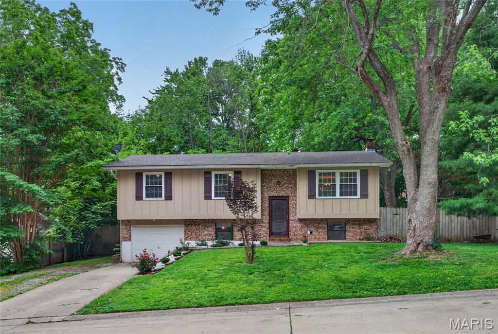 This charming split-foyer home, located in the desirable Jackson R-2 School District, offers comfort, functionality, and updates throughout! Featuring 3 bedrooms and 1.5 bathrooms, this home provides plenty of space for everyday living and entertaining. The remodeled kitchen shines with white soft-close cabinetry, tiled backsplash, and a plant window over the sink that brings in natural light and the perfect touch of charm. The main level also includes a welcoming living room, dining area, and spacious layout designed for convenience.
Downstairs, you’ll find a huge family room perfect for movie nights or gatherings, along with a half bath, office space ideal for working from home, and a storage/laundry area with utilities. Step outside to enjoy the fenced backyard, complete with a deck for relaxing, a storage shed for outdoor equipment, and a playset that stays with the home, making it ready for outdoor fun from day one. Down the road at the end of the street is a quiet, small park along with a gentle flowing creek for days when the keys need an adventure.  A one-car garage adds even more practicality to this move-in-ready property.