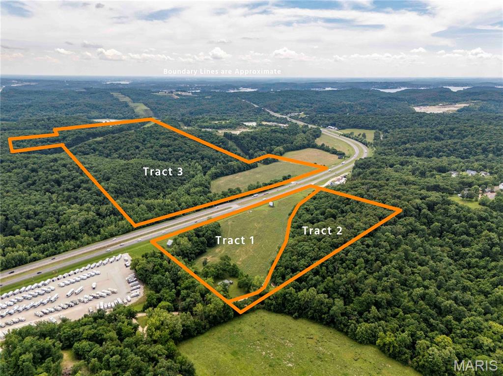 AUCTION LISTING - List price is not indicative of Seller’s final reserve amount.  This property is part of an online bidding event.  This sale will be executed with a no-contingency contract provided by brokerage representing the Seller. See MLS Supplement Document for complete details. The Fleeman Trust property presents a rare opportunity to purchase 156± acres (selling in three tracts) of highly visible and versatile real estate located along the heavily traveled Highway 54 corridor near Bagnell Dam and Lake of the Ozarks. This Missouri Century Farm will be offered at public auction in three individual tracts, allowing buyers the flexibility to purchase development property, recreational acreage, investment land, or future commercial opportunities in one of Central Missouri’s fastest-growing regions. Located directly on U.S. Highway 54, the property benefits from exceptional visibility and accessibility along one of the primary travel corridors into the Lake of the Ozarks area. Missouri Department of Transportation traffic studies indicate portions of the Highway 54 corridor in the Lake area carry traffic volumes approaching 20,000 vehicles per day, highlighting the exceptional commercial exposure and long-term investment potential this property offers. The location places the property within close proximity to Bagnell Dam, historic Camp Bagnell Restaurant & Campground, Lake Ozark, Osage Beach, and surrounding tourism, recreational, and commercial destinations that continue to drive strong traffic throughout the corridor. 
The combination of Highway 54 frontage, utility access, recreational appeal, and future development potential makes this offering uniquely suited for investors, developers, commercial users, recreational buyers, or those seeking long-term land appreciation near the Lake area.