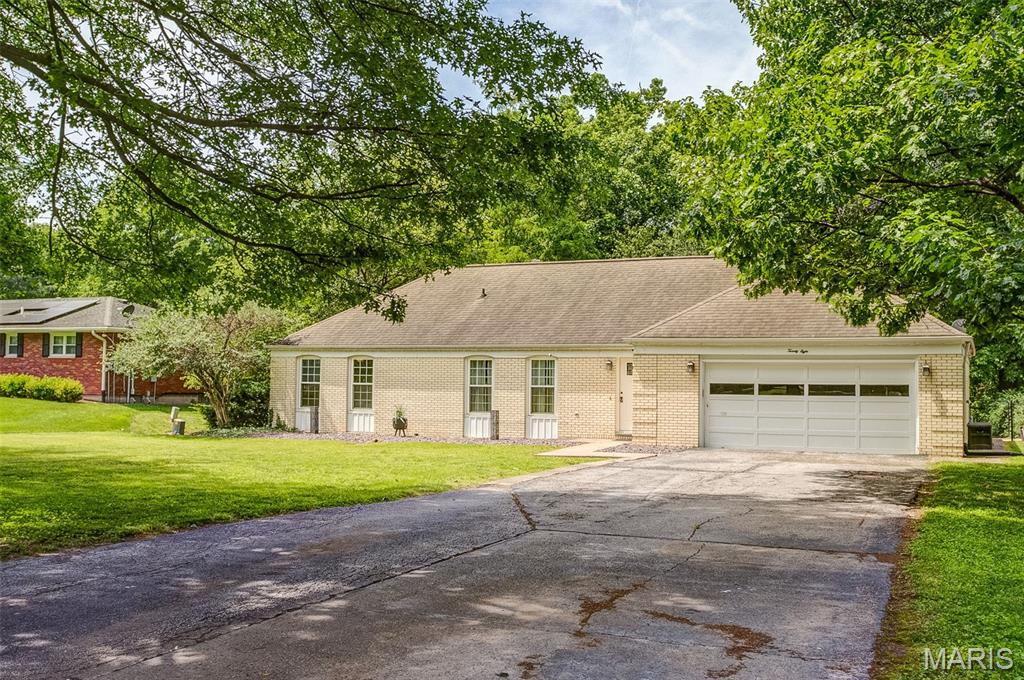 Location, location, location! This spacious 4 bedroom, 3 bathroom home offers the perfect blend of comfort, space, and outdoor living! Situated on a beautiful .93 acre shaded lot, the property features a large kitchen with abundant cabinet space and a sliding glass door leading directly to the pool deck, perfect for entertaining and summer gatherings. The lower level provides excellent additional living space, while the walkout basement offers added functionality with a large laundry room and plenty of storage. An attached 2 car garage and additional storage shed provide even more room for all your needs. Step outside and enjoy the freshly painted deck, new retaining wall by the back patio, and above ground swimming pool surrounded by mature shade trees. A new pool motor will also be included with the property. Recent updates include a new front door with complete reframing, new roof and doors on the shed, updated water pump system for the laundry room and kitchen, and a new water heater installed in March 2026. The washer and dryer are only 3 years old, and the property also includes a Cardinal Care Club Membership through Cardinal Plumbing beginning April 2026 for added peace of mind. Don't wait on this one, it is a must see property with so much to offer! SELLER IS OFFERING $2,500 IN SELLER CREDIT!