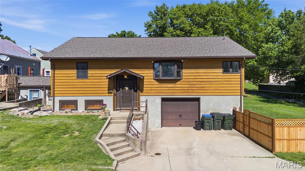 Unique properties like this rarely come available in Waterloo! This incredible opportunity offers flexibility for an owner-occupant, multi-generational setup, or investor seeking strong income potential.  The property features four total living spaces consisting of an impeccably maintained main residence, an attached lower-level in-law/basement apartment , and a beautifully updated duplex fronting Magnolia Street.

The main home has been exceptionally cared for with numerous updates including freshly painted rooms, newer roof, beautiful finishes, and excellent curb appeal. The main level is an open floor plan concept along with 2 bedrooms (including the primary suite w/ private bathroom & walk-in closet) and a huge screened-in porch overlooking the spacious side yard. The walkout lower level offers two additional bedrooms, full bath, office/laundry area, & ample storage.   Currently configured as a 4 bedroom, 3 bath residence, the main home also includes an attached 1-car garage plus a detached 1-car garage. The attached garage area is already plumbed for a kitchen setup and, subject to buyer verification, may provide future flexibility for additional living configuration options (dividing the main home into an upper & lower level unit with conversion of the attached garage).  The main home has always been owner-occupied so no rental history is available.

Connecting the main home and Magnolia duplex is a lower-level in-law/basement studio suite offering additional flexibility for extended family, guest use, or potential income opportunities. This unit features 1 bathroom, kitchen/living space, & sleeping area/bonus room.  Please verify with your Buyer's Agent details regarding this unit.  

The Magnolia duplex is an older building connected to the main home through studio suite and has been extensively remodeled over the years while maintaining its original exterior character. Each unit offers a main-level bedroom, full bath, kitchen, living room, main-floor laundry, plus a loft area with an additional bedroom — creating 2 bedroom, 1 bath layouts on each side.  When you walk in the front doors, you will be wowed by the soaring ceilings as you look up to the loft!  Tenants love the covered front porches & fenced, private rear courtyards for ultimate outdoor privacy, entertainment, & relaxation.

Current rent amounts are believed to be well below prevailing market rates for Waterloo, creating additional upside potential. 
Whether you are looking to live in the primary home while collecting rental income, create a multi-generational property, or maximize future investment potential, this property offers possibilities rarely found in today’s market.  Modern updates, income potential, flexibility, and truly one of a kind — this is a property you MUST need to see in person to fully appreciate.  Agent Related