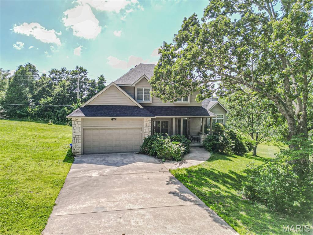 Welcome to this beautifully updated two-story home in the sought-after Oak Knoll South subdivision. Set on a large lot with peaceful pasture views, this 4-bedroom, 3.5-bath residence combines timeless finishes with modern updates in a desirable location close to town and walking trails.
Inside, tall ceilings and rich hardwood floors flow throughout the main living areas, creating an inviting and light-filled atmosphere. The thoughtfully designed kitchen features custom cabinetry, granite countertops, and stainless steel appliances, perfect for both everyday living and entertaining. The adjoining living space boasts a cozy gas fireplace, adding warmth and character.
The home offers updated bathrooms, generous bedroom sizes, and a finished walkout basement that provides additional living space for a rec room, home office, or guest suite. Recent upgrades include a new roof, water heater, and water softener, offering peace of mind for years to come.
Enjoy the privacy and scenic views from the expansive backyard while still being conveniently located near trails, amenities, and town conveniences. Call today to schedule your private showing!