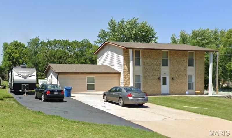 Anyone looking for a unicorn? This property is in the middle of St. Peters, almost an acre, unincorporated and has NO HOA! Freedom alongside convenience is finally available! As you walk around outside, a sizeable front yard sets the home back from street traffic - there's room to park a 5th-wheel camper AND the truck in the driveway! When not in use, don't worry about storing that camper or boat somewhere else - the driveway extends down the property line and hosts a carport sized for big-kid toys! Behind the house - a massive, park-like backyard beckons you to frolic, then cool off in the 27' pool or lounge on the large deck with privacy screen! There is even a VERY clean, solidly-built shed to easily store equipment, yard tools and anything else for the off-season. Inside are more joyful surprises! A brand-new front door and LVP flooring on the main level, gorgeous hardwood on the second floor, dual closets in the primary bedroom, an incredible rec room just off the sizeable kitchen with TONS of cabinet/counter space, a breakfast bar and newer appliances, a separate dining room, another bonus space with French doors (home office, music room, play room or library?), fresh paint throughout and a blank slate in the basement for you to personalize! This one is an absolute dream of a wish list with every item checked - come imagine your life in this oasis without an hour-long commute!