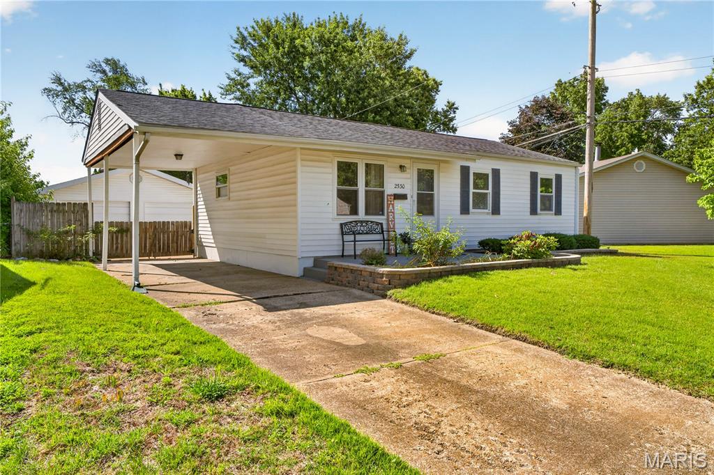 Welcome home to 2530 Grants Parkway in Florissant, where thoughtful updates and timeless charm come together in an exceptional location within the Hazelwood School District. Situated on a quiet, tree-lined street, this beautifully updated home is move-in ready and waiting for its next owner.
Step inside to discover refinished hardwood floors that add warmth and character throughout the main living areas. The completely updated kitchen features brand-new flooring, cabinets and countertops creating a fresh and inviting space for everyday living and entertaining. The home also offers a luxurious full hallway bathroom, beautifully designed with stylish finishes, along with a private half bathroom in the primary suite, providing added comfort and convenience.
Need extra room to spread out? The finished lower level, complete with new carpet, offers valuable additional living space perfect for a family room, recreation area, home office, or workout space.
Outside, you'll appreciate the fenced backyard, ideal for pets, play, or summer gatherings, as well as the oversized two-car detached garage that would be great for a mechanic, providing plenty of room for vehicles, storage, and hobbies.
Homes with this level of updating and care don't come along often. Schedule your private showing today and see everything 2530 Grants Parkway has to offer before it's gone!