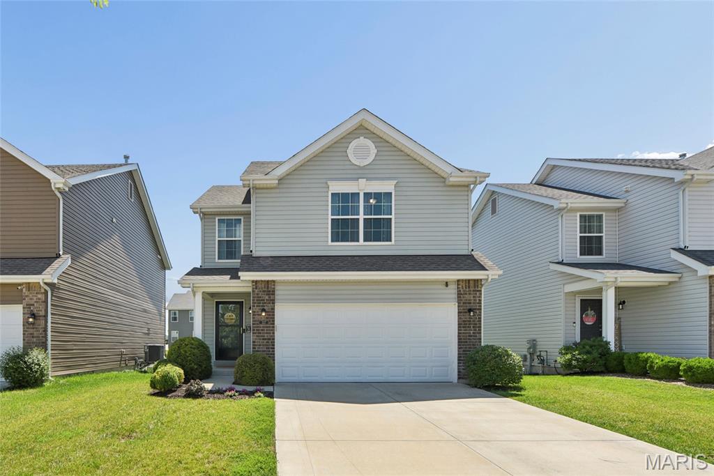 There’s a certain kind of magic that happens when you pull into a quiet suburban street, the sidewalks stretching out like an open invitation and the promise of something new waiting just beyond the front door. At 337 Charlestowne Place Dr, that promise becomes reality. Built with today’s lifestyle in mind, this home feels like the fresh start so many dream about—where comfort meets style and every space is designed to live beautifully and effortlessly. Step inside and you’re welcomed by an airy, open-concept main floor where the living, dining, and kitchen areas flow together as naturally as conversation at a dinner party. Luxury vinyl plank floors ground the main level living space with warmth and durability—elegant enough for a Martha-worthy interior design yet relaxed enough to handle real life with ease. The kitchen offers ample cabinet space and generous bar seating, ready for everything from pancake breakfasts to late-night storytelling over takeout and playlists. It opens seamlessly to the living area, creating a backdrop for gatherings that feel both elevated and easygoing. A conveniently placed half bath on the main level ensures guests feel right at home. Upstairs, the primary suite is your personal retreat. Spacious and serene, it offers room to exhale at the end of the day. Two walk-in closets provide abundant storage, while the ensuite bath—with its double vanity and expansive room to move around—make mornings feel less rushed and more refined. Two additional bedrooms, a full hall bath, and a thoughtfully located laundry room complete the second floor, keeping everyday living beautifully streamlined. The lower level adds flexibility to fit your story. A finished room with egress can adapt to your needs—ideal for a home office, creative studio, fitness space, or guest retreat. There’s also ample unfinished space with a bathroom rough-in, offering the opportunity to expand and customize as life evolves. An attached two-car garage includes an electric vehicle charger outlet, blending convenience with forward-thinking design. Out back, a sunny patio and fenced yard create a private outdoor escape—perfect for morning coffee rituals or evening get-togethers under open skies. Sidewalk-lined streets invite leisurely strolls and energizing jogs, while nearby community parks offer even more ways to enjoy the outdoors. The home is conveniently located near Orchard Farm Senior High School, local green spaces and playgrounds, and just a short distance from the shops, dining, and unique charm of New Town. This is more than a house, it’s a place to build traditions, host celebrations, and savor everyday moments. It’s the kind of home where style meets soul, where practicality pairs with polish, and where your next chapter is ready to begin. Come experience it for yourself. The American dream is alive and well at 337 Charlestowne Place Dr—and it’s waiting for you to walk through the door!